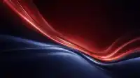 Glowing red ribbons arcing above deep steel-blue waves on black, layered warm-cool Crimson Drift wallpaper