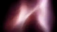 Scattered rose-pink light bursts crossing diagonally on a grainy black field, hero gradient noise Hero Haze wallpaper