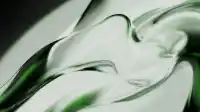 Reclined wave of liquid emerald glass sweeping across the frame with rich green core veins, soft studio ground, Liquid Emerald wallpaper
