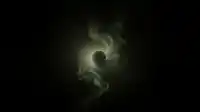 A dark sphere floats wrapped in pale green smoke against black space, eerie still Moss Eclipse wallpaper
