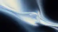 Glossy steel blue silk curls into a tight swirl, warm overhead glow and dark vignette corners frame this Silk Flow scene