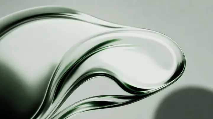 Elongated emerald glass droplet swooping across pale studio ground with a soft trailing tail, Liquid Emerald wallpaper